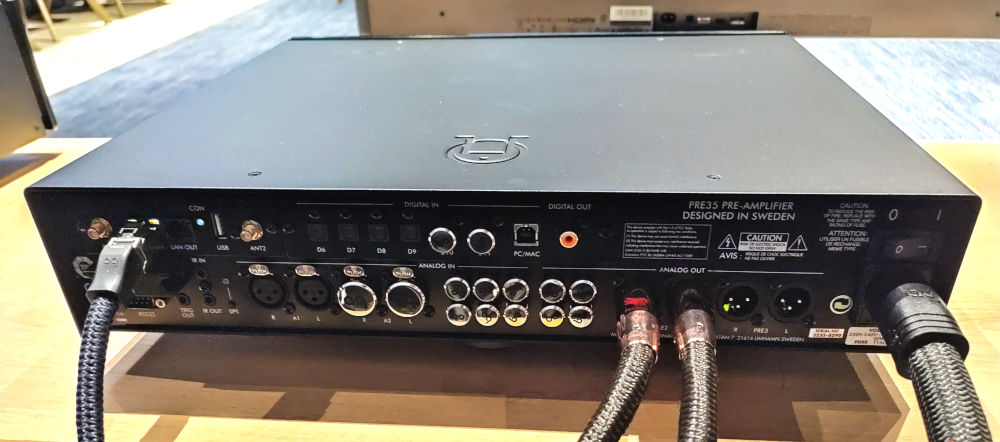 AudioQuest Noise Stopper Caps fitted to unused sockets on the back of a Primare amplifier